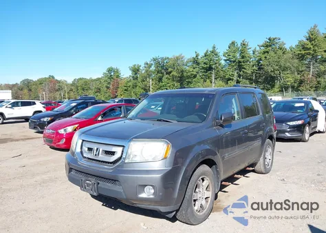 2010 Honda Pilot Touring z USA, uszkodzony, nr VIN 5FNYF4H89AB012332